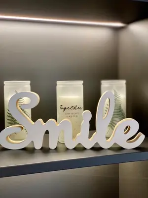 a shelf with a sign that says spa and candles at Maxim - Easy Home Booking in Nice