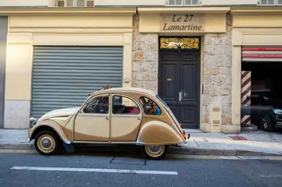 a small car parked in front of a building at JEAN MEDECIN - Modern and brand new 1Br flat in Nice
