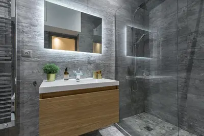 a bathroom with a sink and a shower at Cosy Cocoon Place du Pin in Nice
