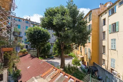 an overhead view of an alley between buildings at Cosy Cocoon Place du Pin in Nice