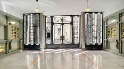 an empty room with doors and windows in a building at Nestor&Jeeves - GLORIA BEACH - Very close sea - Prestigious building in Nice
