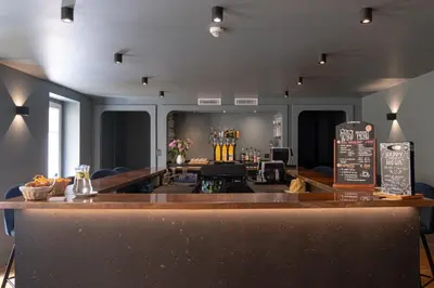 a bar in a restaurant with a counter top at Boutique Hotel Nice Côte d'azur in Nice