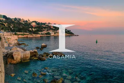 a cross in the water next to the ocean at Seaside Studio by iCasamia it in Nice