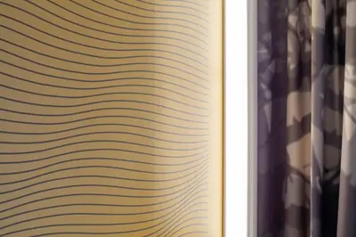 a close up of a book with lines on it at B&B HOTEL Nice Aéroport Arenas in Nice