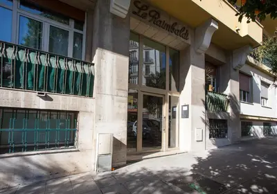 a store front with glass doors on a street at 26 nice , La Riviera in Nice