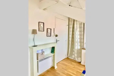 a room with a white shelf and a door at Studio on the Attic 3min from the Sea & Main street in Nice