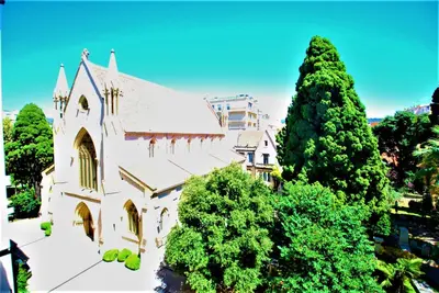 an overhead view of a church surrounded by trees at Congrès Carré d'Or by Booking Guys in Nice