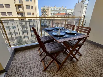 a table and chairs on a balcony with a view at Legion Suite - Your perfect vacation ! in Nice