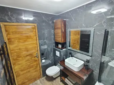 a bathroom with a sink and a toilet and a mirror at Legion Suite - Your perfect vacation ! in Nice