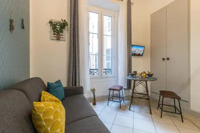 a living room with a couch and a table at MY CASA - SAINT SIAGRE 1 in Nice