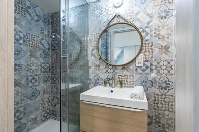 a bathroom with a sink and a mirror at MY CASA - SAINT SIAGRE 1 in Nice
