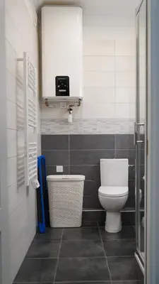 a bathroom with a toilet and a sink at Cozy studio with a sea view in Nice