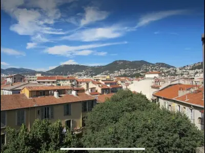 a view of a city with buildings and trees at Homelivia, Lovely One bedroom flat Place GARIBALDI et PORT in Nice