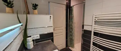 a bathroom with a mirror and a sink and a shower at Wonderful heart of Nice in Nice