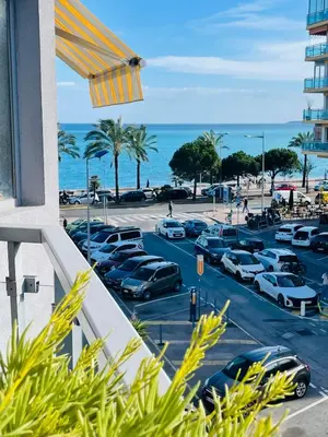 a view from a balcony of a parking lot at Cocon douillet face à la mer de Cagnes sur mer in Cagnes-sur-Mer