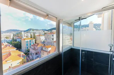 a bathroom with a view of the city at La Terrasse du Port AP4212 in Nice