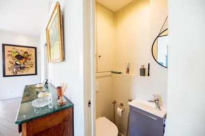 a bathroom with a toilet and a sink at La Terrasse du Port AP4212 in Nice