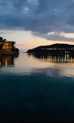 a view of a body of water at sunset at Moderne, 2 chambres, 6 Couchages, EASY CHECK-IN in Nice