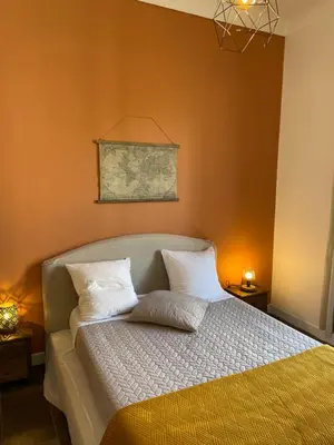 a bedroom with a bed with two pillows on it at Moderne, 2 chambres, 6 Couchages, EASY CHECK-IN in Nice