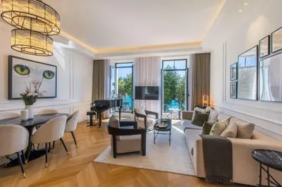 a living room with a couch and a table at QUAI PROMENADE New Seafront Balcony Air Conditioning in Nice