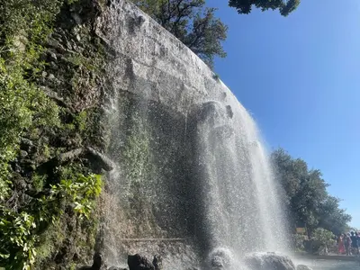 a waterfall on the side of a stone wall at Garibaldi 3 chambres 6 couchages, EASY CHECK-IN in Nice