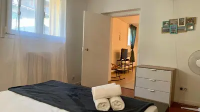 a bedroom with a bed with two towels on it at ApartHotel Riviera - ISTRIA 1- Old town Promenade des Anglais - Superbe Appartement Superior 2 Pièces AC in Nice