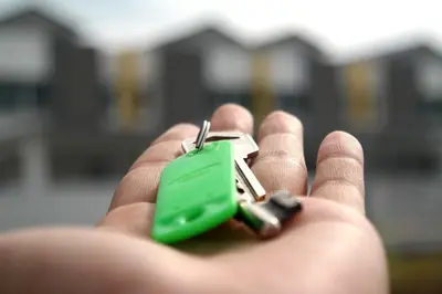 a person holding a small green object in their hand at ApartHotel Riviera - Maison de la Poissonnerie - Vieille Ville - Grand Appartement 3 piece AC - 5min de la Promenade des Anglais in Nice