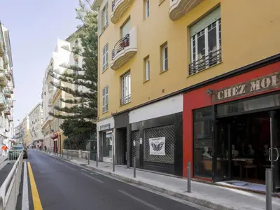 an empty street in a city with buildings at Apartment Le Paganini by Interhome in Nice