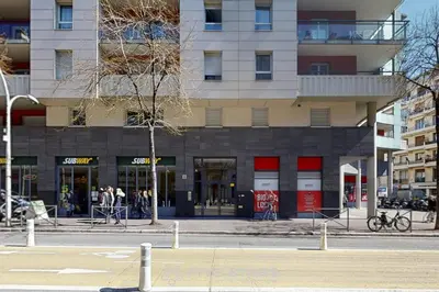 a building on the corner of a city street at LUXURY BEACH five STARS HOLIDAY HOUSE in Nice