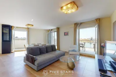 a living room with a couch and a table at LUXURY BEACH five STARS HOLIDAY HOUSE in Nice