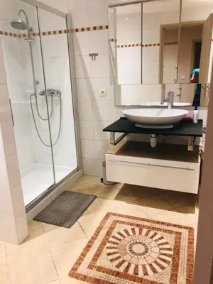 a bathroom with a sink and a shower at City center cute flat with sea view one bedroom in Nice