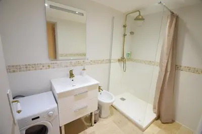 a bathroom with a toilet sink and a shower at Nice Renting - PAIROLIERE - SPACIOUS FLAT - OLD NICE - MASSENA - TERRACE in Nice