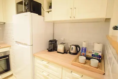 a kitchen with a counter with appliances on it at Nice Renting - PAIROLIERE - SPACIOUS FLAT - OLD NICE - MASSENA - TERRACE in Nice