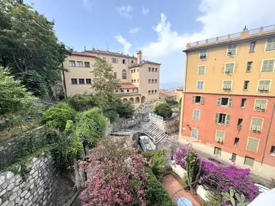 an aerial view of a city with buildings at ApartHotel Riviera - BALCON HONORE 1 - Old Town - 5 mn Promenade des Anglais et Plage - Charme Absolu - Appartement 2 pièces avec Balcon AC - Vue mer et Ville in Nice