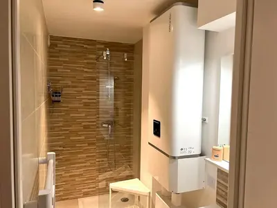 a bathroom with a shower and a toilet and a sink at Dana centre mer 16 in Nice