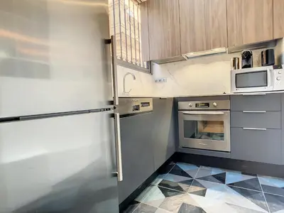 a kitchen with a refrigerator and a microwave at Nestor&Jeeves - GLORY RIVIERA - Central - Close sea in Nice
