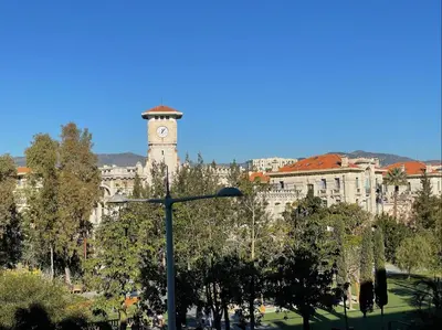 a large building with a clock tower in the background at Nice Renting - JAURES - Cosy Flat - Nice old town - Great view - AirCon in Nice