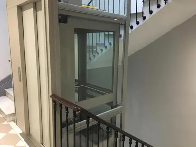 a stairway with a glass door on a staircase at Palais Gioffredo place Massena in Nice