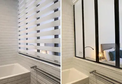 a bathroom with a tub and a window at Nestor&Jeeves - REINE MARIE TERRASSE - Central - Very close sea - Top floor in Nice