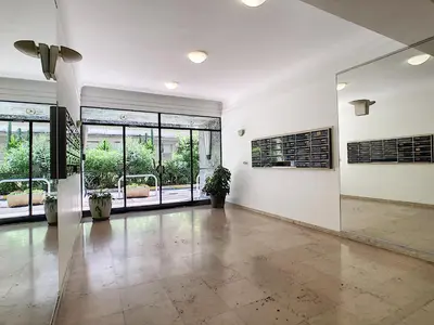 a large room with large windows and a large lobby at Nestor&Jeeves - REINE MARIE TERRASSE - Central - Very close sea - Top floor in Nice