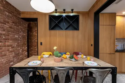 a dining room with a table and chairs at FEEL HOME - BUNICO in Nice