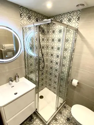 a bathroom with a shower and a sink at Maison de la Marine in Cagnes-sur-Mer