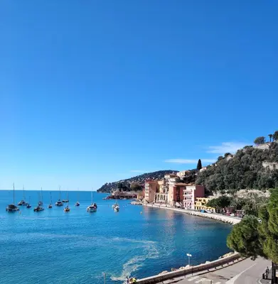 a view of a harbor with boats in the water at 35m2, luminous loft close to the beach in Villefranche-sur-Mer