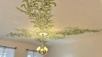 a chandelier hanging from a ceiling in a room at ApartHotel Riviera - JEAN JAURES 1 - Vieille Ville - Appartement de 3 pieces AC - 100m de la plage in Nice