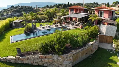 an aerial view of a house with a swimming pool at Villa de luxe piscine vue mer in Nice