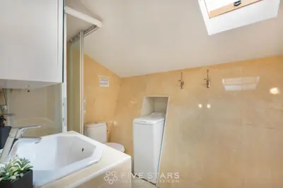 a bathroom with a white sink and a toilet at Vieux Nice - Jean Jaurès FSHH in Nice