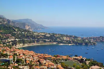 a view of a city with boats in the water at Superbe studio sur Nice in Nice