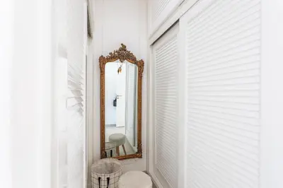 a mirror in a hallway with white walls at VILLA NICE-GAIRAUT by RIVIERA HOLIDAY HOMES in Nice