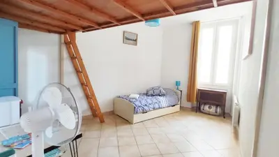 a white bathroom with a shower and a white sink at Appartement 3 pièces ultra centre nice-ville in Nice