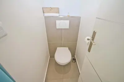 a small bathroom with a toilet in a stall at Florida Sea Front in Nice